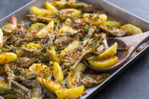 Ricottine al forno con carciofi, mimosa e maggiorana: la ricetta